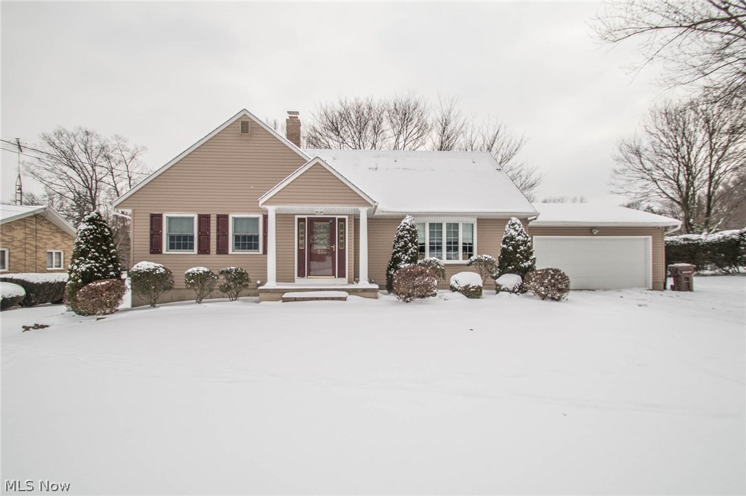 Gorgeous 4 bedroom, 3 full bathroom Cape Cod in Tallmadge, close to shops and restaurants in Town Centre! A spacious living room and updated kitchen with an island for seating, 2 pantries, and plenty of cabinet and counter space. From the kitchen, walk out to the three season room to overlook the half acre lot. The main bath was remodeled in 2016 with a beautiful tile shower and granite countertops. A mudroom with built-in shelving, a dining room, and two bedrooms complete the first level. Hardwood flooring and crown molding throughout! There are two generously sized bedrooms upstairs, along with another full bathroom. Even more living space downstairs, including a large family room, full bathroom, plus a bonus room with a kitchenette and walkout that could be utilized as a mother in law suite. The large yard has a fire pit, a storage shed, and backs up into a lovely park! All new siding (09), garage roof (09), hot water tank (2013), and regularly serviced HVAC!