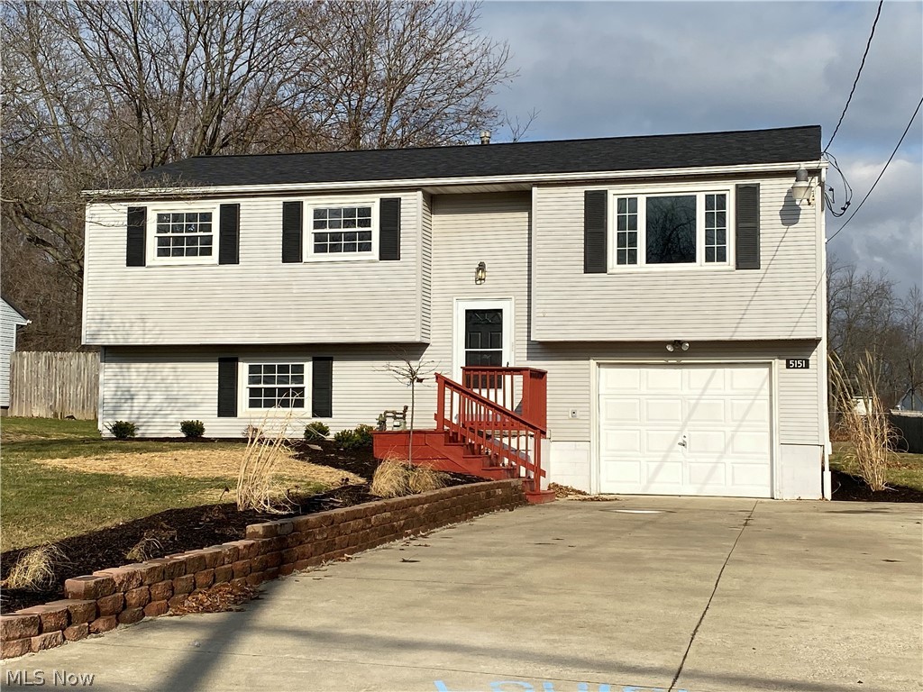 Nicely updated bi-level in Louisville schools. New roof 2019. Updated kitchen, new bathroom, freshly painted throughout with modern neutral colors, and new floor coverings throughout. Large lot with deck and 16 x 20 outbuilding with loft.