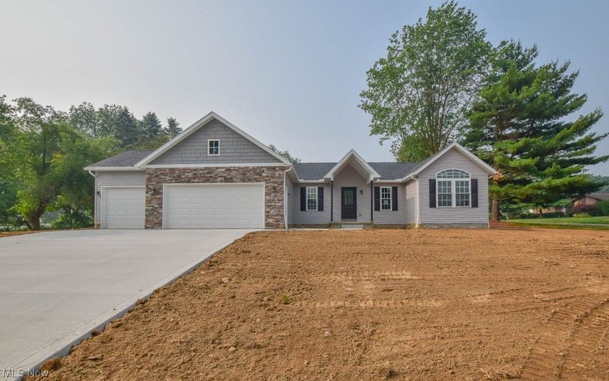 You don't want to miss this fabulous new construction ranch in Norwood Hills! This home features an appealing open floor plan with a vaulted living room that's perfect for entertaining and everyday living. The dream kitchen is a standout feature, boasting granite countertops, stainless steel appliances, and a center island with bar seating. The adjacent dining area provides easy access to a covered patio overlooking the nicely sized backyard. There are three comfortable bedrooms and two full bathrooms, including a master suite with a walk-in closet, double sink vanity and a tiled step-in shower. The main bathroom offers a granite vanity top and a tub/shower combo. A 1st floor laundry makes for true one floor living! In addition to the main living areas, there is a 13 course full basement that provides abundant storage space or the potential for future expansion and it's already plumbed for another full bath. The three-car attached garage with insulated doors and openers is a real bonus