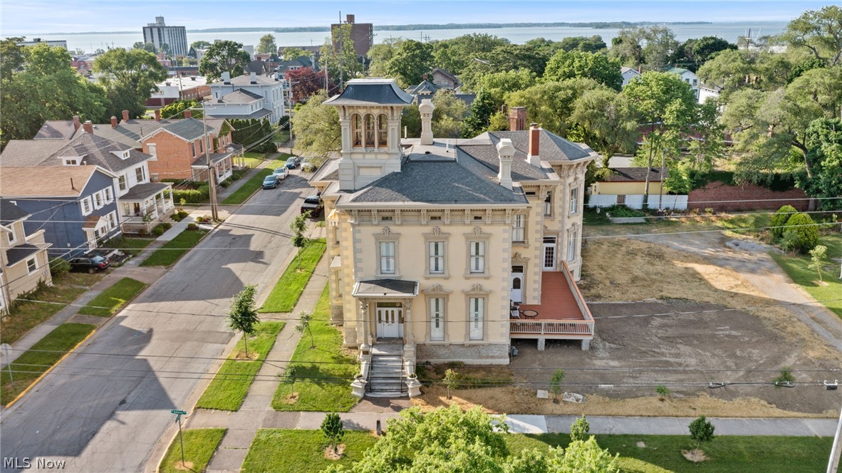 This expertly restored and furnished Italianate home is your chance to own a piece of history. Registered on both National registries for historic homes and the Underground Railroad. First built and Owned by Samuel Torrey in 1850, later owned by the Mayor of Sandusky, Rush Sloane. The opportunities are endless, whether you are looking for a spectacular private residence or a business opportunity. Bonus living quarters on the 3rd floor for live in B&B owner or extra space. Take a step back into history and experience the 1850's with modern amenities. 27 rooms in total; 10 bedrooms, 10 full baths and 2 half baths. First floor has a handicap accessible bedroom and full bath. The 2nd floor has 6 bedrooms and 6 full baths. 3rd floor has a separate living suite with 3 bedrooms, 2 full baths, beautiful kitchen and stairway up to the widow's walk with panoramic views of Sandusky including Cedar Point. Beautiful hardwood floors throughout the entire house except for the 3rd floor which is carpeted. 8 out of the 10 bedrooms have a full private bathroom within the room. First floor has a living room with a library leading out to the brand new veranda. Proper ladies parlor and separate gentleman's parlor. The gentlemen's parlor hosts 2 half baths. Beautiful custom interior wood shutters throughout, crown molding and countless other updates made during the renovation. Don't miss out on this opportunity! Currently being run as a B&B.
