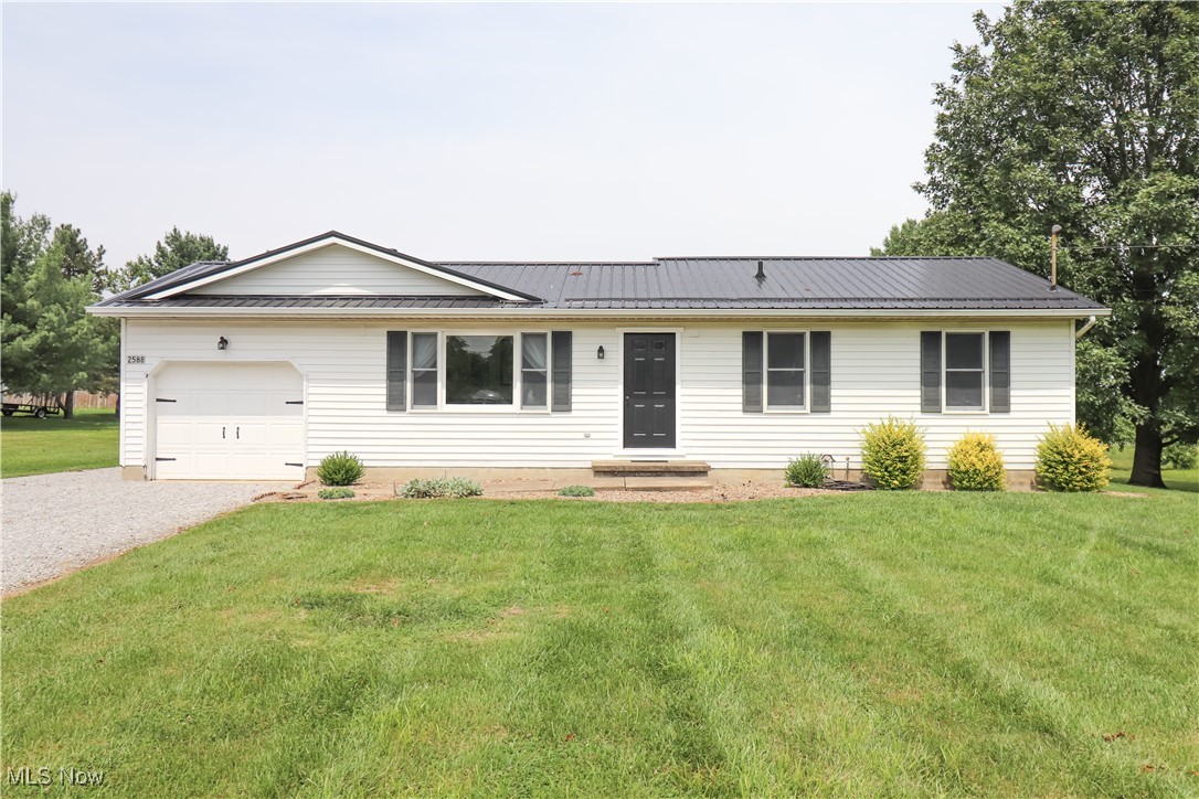 This is a cozy, 3-bedroom Ranch home that offers an eat in kitchen, 2 full baths and an unfinished basement that includes laundry area. There is plenty of storage with the potential for being finished. The roof was replaced in 2019 with a steel roof. The home sits on 1.5 acres and has an attached one car garage as well as a 12 x 24 storage shed with lofts that was added in 2019. The property includes a chicken coop. Updates include hot water heater in 2024, Steel roof added in 2019. Elevated garden beds were added in 2018/2020, Cement patio, gravel, fresh interior paint. The water softener is leased and will be removed prior to closing. Call today for your private showing of this home in the country.