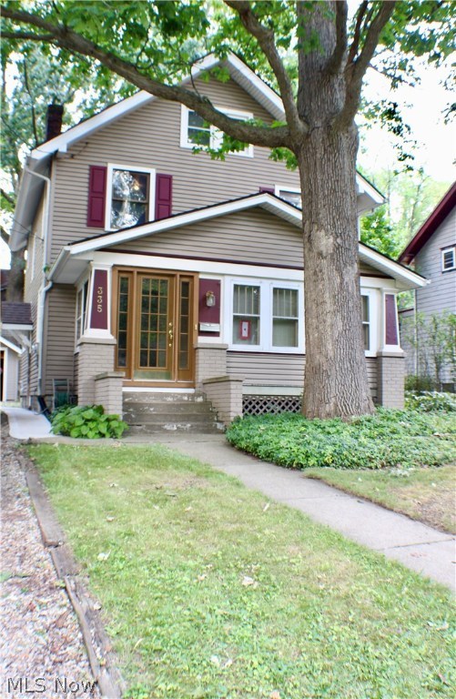 Welcome to 335 N Willow Street this Charming 4bed 1bath home is located on a quiet street within walking distance to downtown Kent restaurants, shopping & walking trails. First floor features closed in front porch w/ french doors opening to living room featuring fireplace w/ built-ins original hardwood floors that continue into the dining room featuring a built-in window seat. Kitchen features floor to ceiling cabinets. Small room off the kitchen makes a perfect space for a mudroom/office/future 1/2bath. 2nd floor 3bedrooms w/ original hardwood floors. Master has walk-in closet! Fully Updated bath w/ built-ins. Hallway built-in adds charming character to the home! 4bed is located on 3rd floor attic space fully finished w/ heat & window a/c unit. Outside features NEW SIDING 16' NEW ROOF 16' Back patio makes perfect spot for evening cookouts or bonfire. You don't want to miss out on this charming home!