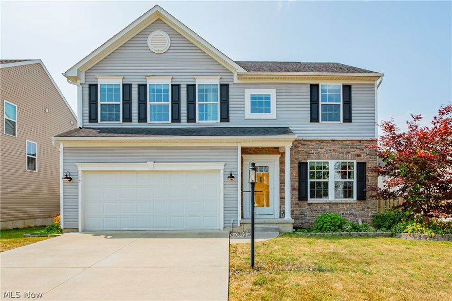 So much to love about this 4 bed, 2.5 bath younger gem of a Colonial. Enter into a cool Living Room with Shiplap feature wall and Rustic Art Piece. On to the Spacious Family Room with a Gas fireplace that opens up to an Island Kitchen and light filled Breakfast Room. All Kitchen Appliances stay. This floor includes a 1/2 bath and mudroom cubby off Kitchen. Upstairs there are 4 good sized Bedrooms And a super convenient Laundry Room with hanging rails and or shelving! A full sized basement ready to finish and plumbed for a full bath. Step out onto the decorative concrete patio with plenty of room for a table set and grill. The Fenced Yard is a convenient space for family and friends! The seller is providing a home warranty for the purchasers piece of mind. Park like sport area is close by. Enjoy the beauty of the metro park and great city of Berea.