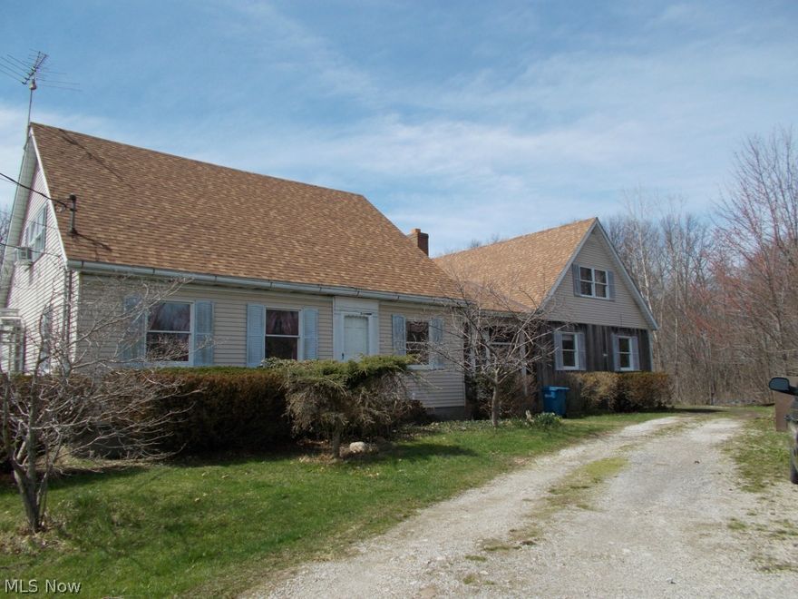 Spacious country home on over 4 acres in Vermilion School District.  Travel down the winding driveway to your new home.  Outside there is a large pond, open yard, and 2 large barns.  Inside you'll find an extra large open kitchen with fireplace, huge family and living room, and a possible 4th bedroom on the first floor.  The master suit is located up a private set of stairs off the foyer and has a walk in closet and master bath.  A second set of stairs is located off the family room which takes you to the other 2 bedrooms and a full bath.  Plenty of storage space throughout including full basement, large closets, and 1 car garage that can easily be converted to 2.