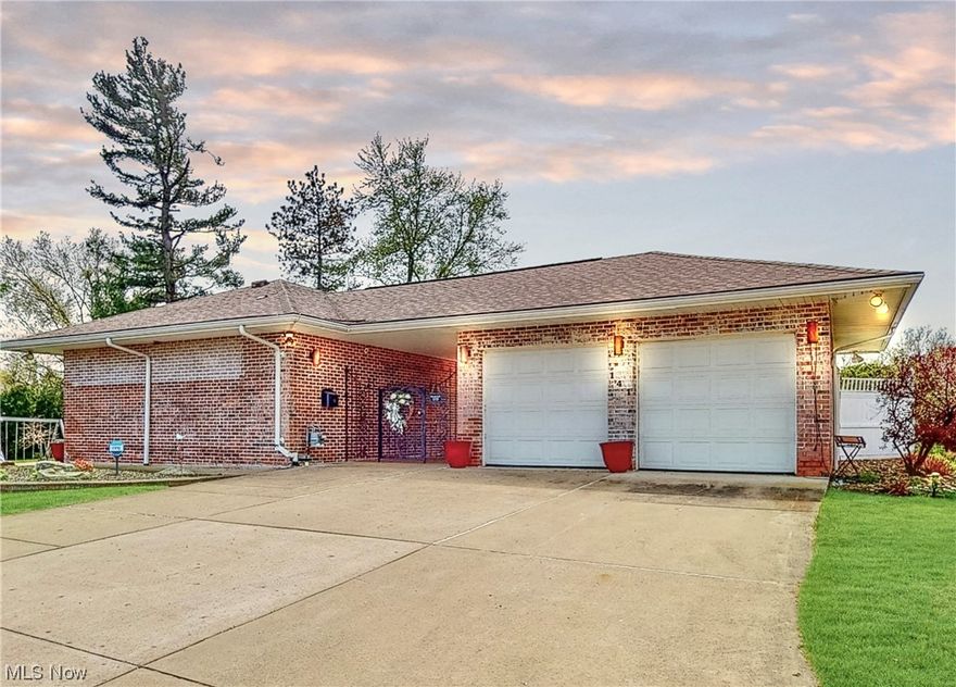 Come Take a tour of this stunning brick ranch home with a sprawling .67 acre yard that will surely take your breath away. Blending sophisticated style with comfort, this 3-bedroom, 2.5-bathroom home is a one of a kind gem you won't want to miss. The unique gated entry way leads to an inviting private ‘courtyard’ that opens to an equally impressive interior. The bright and airy living area flows seamlessly into the dining space, perfectly designed for entertaining guests or unwinding after a long day. The updated kitchen comes equipped with stainless steel appliances, sleek countertops, and plenty of storage space for all your culinary needs. The large primary bedroom is the perfect retreat, offering ample space to relax and unwind. The two additional bedrooms share a jack and Jill bath and are bright and inviting, with an abundance of natural light that floods through the large picture windows. The vast backyard and side yards are perfect for hosting barbecues, playing sports, or simpl