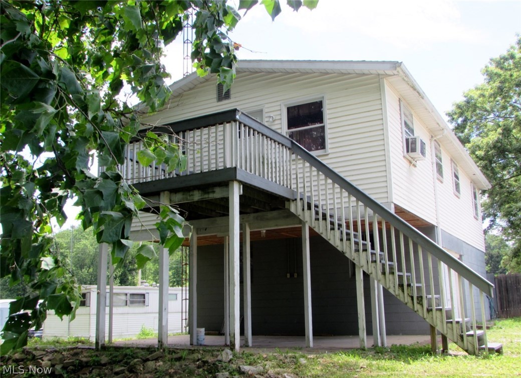 Nice 3 bedroom, 1 bath raised ranch with a fenced in yard and river view! Updated kitchen and bath, oversized 1 car garage plus storage in the basement. Good location, close to town and the new school.