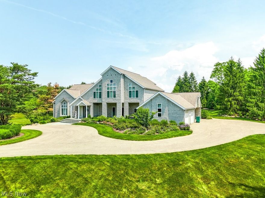 This spectacular Hunting Valley property has 5.42 acres of serenity and paradise with a gorgeous pond, flat greenspace off the large bluestone patio and is perfect for entertaining family and friends. Although built in 1995 it was completely renovated in 2006. The renovation was designed by well known architect John Brown and contracted by Gary Spaeth of ManorBrook Homes. In 2019, another renovation included a completely new kitchen, new powder room and new floors throughout. In 2023, another renovation included transforming two bathrooms on the second level and new carpet throughout the upstairs. Special features of the home include: private first floor primary suite with separate walk-in closets and toilets, large jacuzzi tub and walk-in tiled shower; amazing gourmet kitchen with large center island; a walk in pantry plus a butler's pantry with refrigerator and wine cooler; a wet bar with an under-counter refrigerator and freezer; year round porch overlooking the private backyard; outdoor built-in grill area; two private offices; media room; large loft area on the second floor; additional workspace; both first level and second level laundry rooms; extensive finished lower level with walk out featuring wet bar, game room, recreation room, gym and spacious guest suite, extra storage spaces throughout. A very special property you and your family would love to call home.