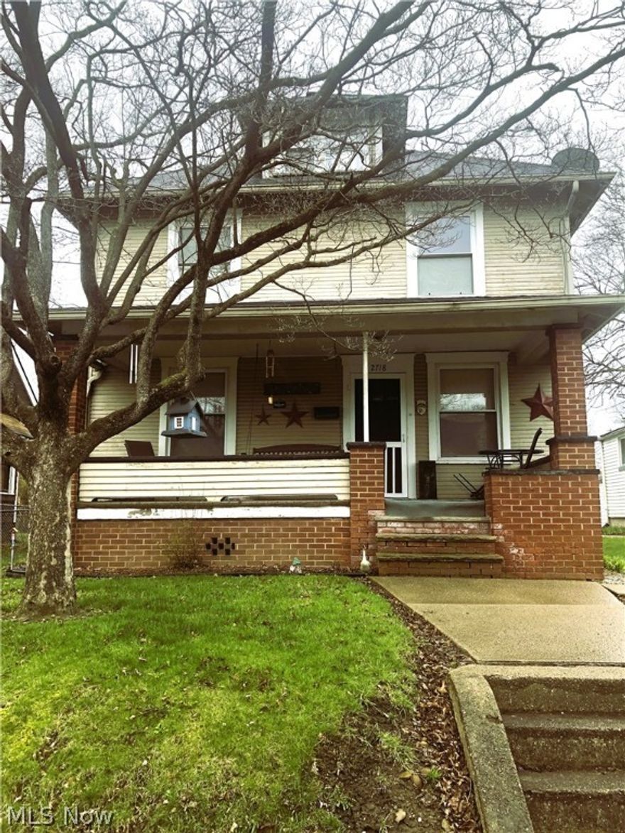 Investors take a look at this SW property. Beautiful natural woodwork throughout home. Glass pocket doors between living and dining room. 3 bedrooms, attic could easily be made into 4th bedroom. Glass block windows in basement. Furnace 2014. Water Heater 2021. 2 car garage with opener and space for additional parking in back by garage. Sold "as is".