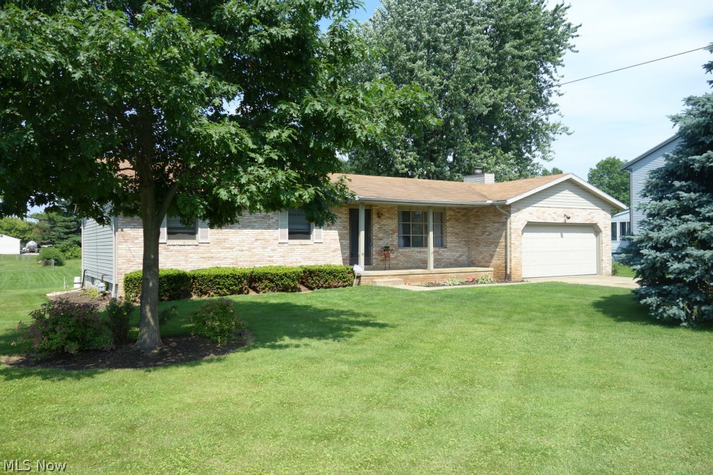 Beautiful light brick home with a fantastic open floor plan. Enjoy hosting others in this house with two different living spaces. Beamed ceilings and a charming fireplace in the family room opens up to the kitchen. Off of the family room is a sliding door that leads out onto the deck. There is a hot tub and a pool out back for enjoyment all summer long. The steps off the deck lead to the patio, the perfect place for a grill. This home is a great place for entertaining! Convenient all one floor living. Master bedroom has master bath. Formal living room and dining room offer more living space.
