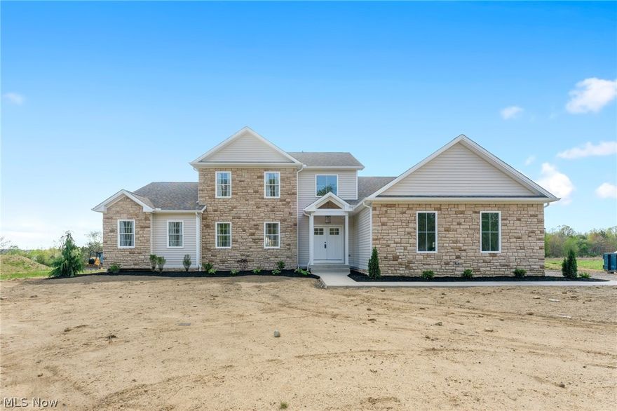 This New construction home is 100% COMPLETE and ready for its 1st owner!  This home offers 4 bedrooms (1st floor owner suite) with 3 full and one half bath - 3 car attached garage with direct steps to basement - 1st floor laundry room with washer and dryer - gorgeous mud room and additional coat closet from garage entrance - gourmet kitchen boasting all appliances * kitchen island with bar seating * custom tile backsplash * quartz counter tops - Gorgeous 2nd floor plays host to bedroom's 2 & 3 that share a full bathroom * loft area great for study or gaming room * 4th bedroom with en suite full bath and walk in closet. Landscape and driveway are in!