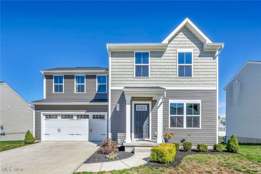 Newly built 3-bedroom, 2.5-bath Colonial with lots of upgrades located on a premium property in the Encore Estates at Heisley Park community, in the Riverside School District.  Conveniently located near OH-2, OH-44, parks, golf courses, shopping, restaurants, and many other local attractions. This move-in ready home offers open-concept living, with an upgraded eat-in kitchen featuring stainless steel appliances, granite countertops, and a center island. A full basement with rough-in plumbing for a full bath offers lots of potential for future living space. The primary suite features a walk-in closet and an en-suite bath with double vanity. A convenient 2nd-floor laundry room and attached 2-car garage round out the tour. . INCLUDED are ALL kitchen appliances along with washer/dryer.