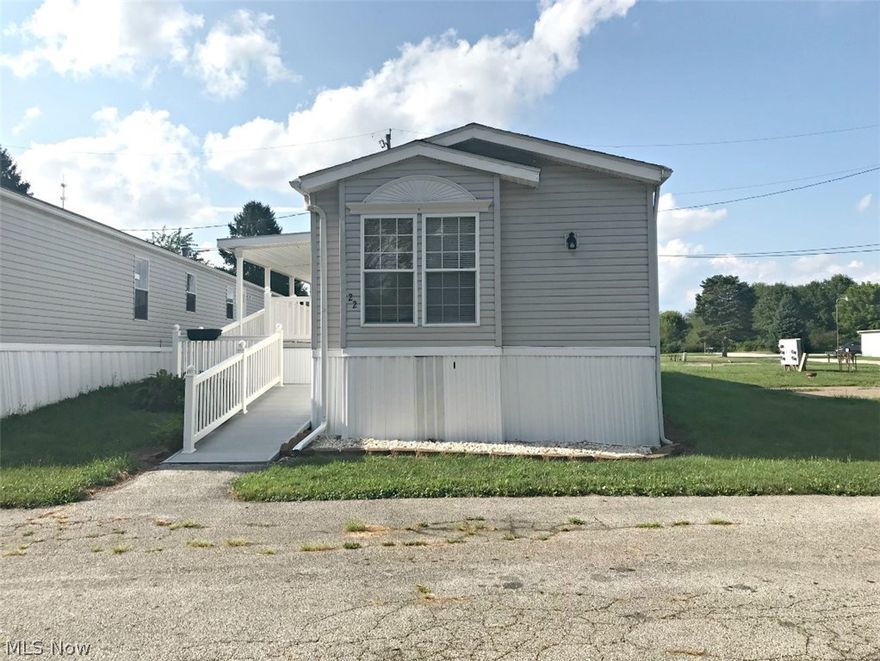 Immaculate mobile home in serene village! Open design with large eat in kitchen and plenty of cabinet space! 2 large bedrooms with full bathrooms! Master bedrooms leads to walk-in closet, discreetly housing the electric panel and hot water tank. Beautiful master bathroom with jacuzzi tub, seperate shower, and double vanity! Second bedroom with double closets and Jack and Jill bathroom! Large handicap accessible deck creates great curb appeal with built-in planters! All appliances included! New central air! Community hiking trail just past parking area!