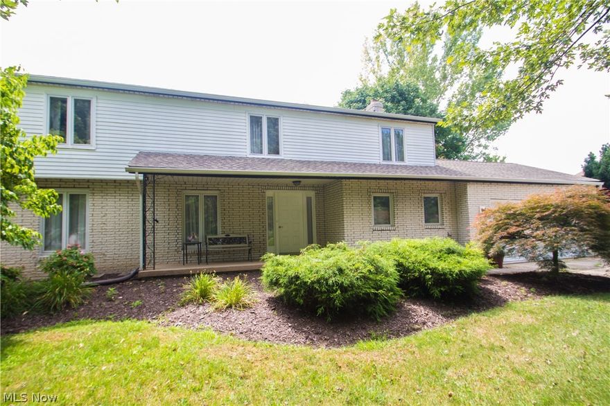 Ready for occupancy so schedule a viewing today. This well maintained 2- story Colonial is a great value for the condition and square footage. Nice neighborhood setting within minutes to city conveniences and freeway access. The covered front porch is a great place to get away and the rear patio overlooking the .6 acre lot is great for entertaining and family fun. A large open foyer entry leads to the spacious living rm and dining area with Bella hardwood flooring and crown molding. A conveniently located Family room with wood-burning fireplace keeps you connected to the adjacent eat-in kitchen featuring beautiful Kraftmaid custom cabinets which includes a large storage pantry and pull-out drawers. Convenient first floor laundry room/ mud room as well as a full basement that offers additional storage and possible living space. Several updates make this property very appealing and one to view. This is not a drive by property. Improvements include a newer roof, hot water tank, garage doo