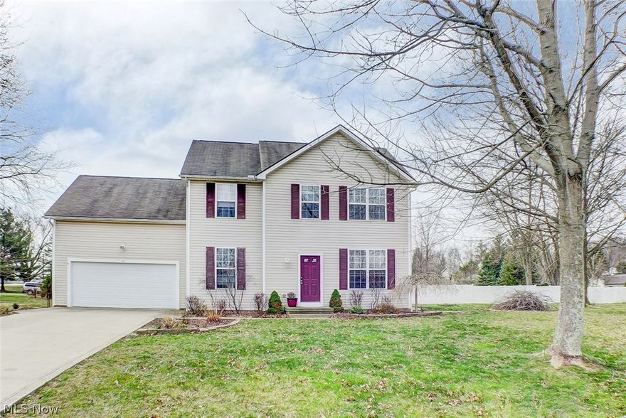 New Listing near Woodridge Schools and Cuyahoga Valley National Park.  There's excellent value in this young 4 bedroom colonial with an open first floor plan - family room has gas fireplace, built-ins and new carpet!  There's a living room or home office option.  The fully equipped kitchen has newer stainless steel appliances, gorgeous hickory cabinets, an eating area plus an island and breakfast bar.  Off the kitchen is the first floor laundry.  Upstairs are 4 bedrooms including an owners' suite, generous closet space and two full baths.  The lower level is partially finished and can be completed for additional living space.  One year home warranty included.