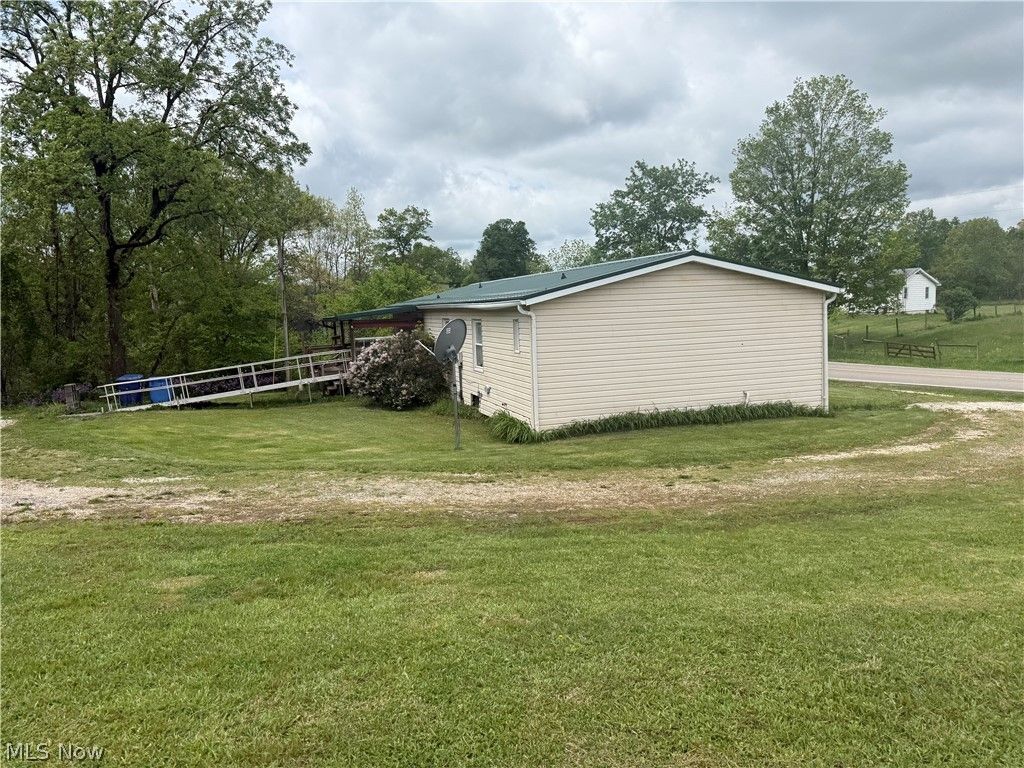 Photo of 54552 Sarahsville Road, Senecaville, OH 43780 (MLS # 5214506)
