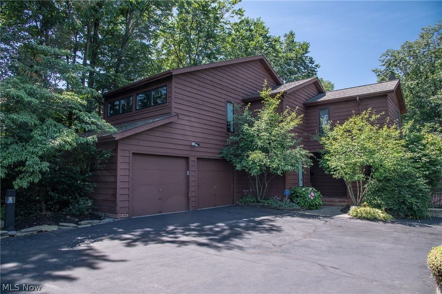 Rare 3 bedroom, 2 1/2 bath stunning contemporary colonial home, located in the heart of the Heights within walking distance to University Circle, shopping and restaurants. Easy access to downtown, Cleveland Clinic and University Hospital. The home is entered via a private drive with three other homes. The entrance foyer offers an open staircase. The step-down living room has hardwood floors, fireplace, built-in bookshelves, vaulted ceiling with skylights and a wall of windows. The dining room overlooks the completely revamped rear yard. The white kitchen with generous counter and cabinet space and breakfast bar opens to the family room with a slider leading to the expansive deck. Step onto the large deck overlooking the fully-fenced in and professionally landscaped private yard. A very large laundry/utility room with access to the two-car heated attached garage round out the first floor. Upstairs, you’ll find a large master bedroom suite that is entered through a private corridor. Ther