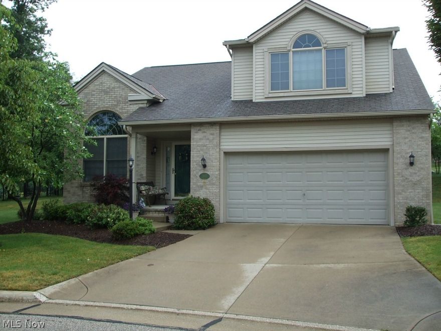 Well kept 3 Bedroom& 2 1/2 bath Cape-Cod free-standing cluster home in North Royalton. As soon as you enter this home you get a feeling of openness. The Living rm., Kitchen and Dining rm. all have a cathedral ceiling . The convenient Kitchen has all wood cabinets , wood floor and lots of storage space. The first floor Master bedroom has a master bath w/tub and 2 large closets. !st floor also has a carpeted office/computer room plus a laundry room. The second level has another Master bedroom(17x17) w/full bath , and also bedroom #3. There is a wood deck off the rear of home. Attached 2 car garage w/opener/drain and electricity plus more storage. The basement is full and waiting for you to finish to whatever you want. Yard is landscaped by professionals.  Home is ready for your move-in.Call now for your showing!!