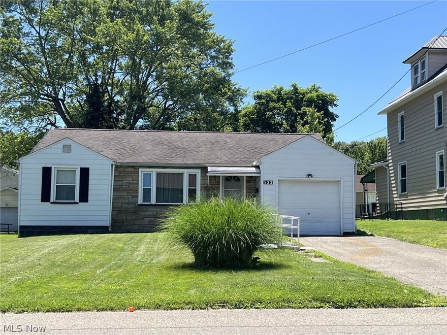 Whether you are starting out or slowing down, take a look at this move in ready two bedroom ranch!  Many major updates have been completed.  Newer roof shingles, furnace, hot water tank and replacement windows.  Walk in shower in the bathroom.  Handicap accessible entrance, it can be removed prior to closing if it's not needed. 100 amp service with harness upgrade in place for a back up generator hook up.  Attached one car garage with opener and pull-down steps for additional storage.  Full basement with toilet that could easily be finished.  Lovely back yard to view from your rear patio.  Newer appliances in the kitchen and washer and dryer are included in the sale.  All you have to do is move in!