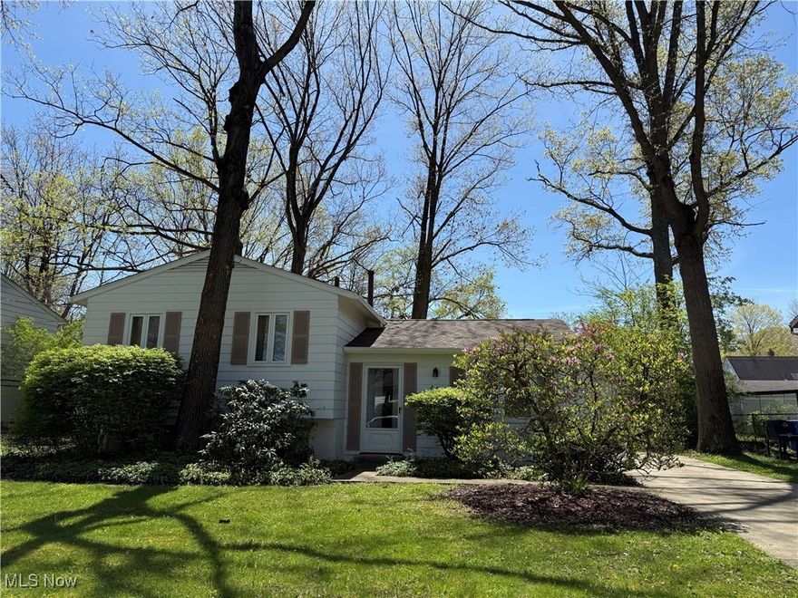 Charming Split-Level on Treed Lot – This One Owner Home is A Must See!
Lovingly cared for and full of character, this charming split-level one owner home sits on a beautifully treed lot and offers a perfect blend of comfort and function. The bright living room overlooks a spacious backyard, creating a serene setting for everyday living. A cozy eat-in kitchen features a ceiling fan, pantry, large window looking over front yard and convenient side entrance providing easy access to the garage.
Upstairs, you’ll find three nicely sized bedrooms and a full hall bath with a tiled tub/shower, plus a convenient linen closet. Downstairs offers a partially finished lower level, complete with a home office, laundry area, generous storage, and large windows that bring in natural light.
Enjoy outdoor living with a paved patio area, detached one-car garage, and concrete driveway. Additional highlights include exterior painted in 2024, new roof and gutter system (with gutter guards) installed in 2024, hardwood floors under most rooms, and included window coverings. This well-maintained home has everything you need—come see it for yourself!  Range, refrigerator, microwave stay. Seller will be selling some of the furniture in the home.
