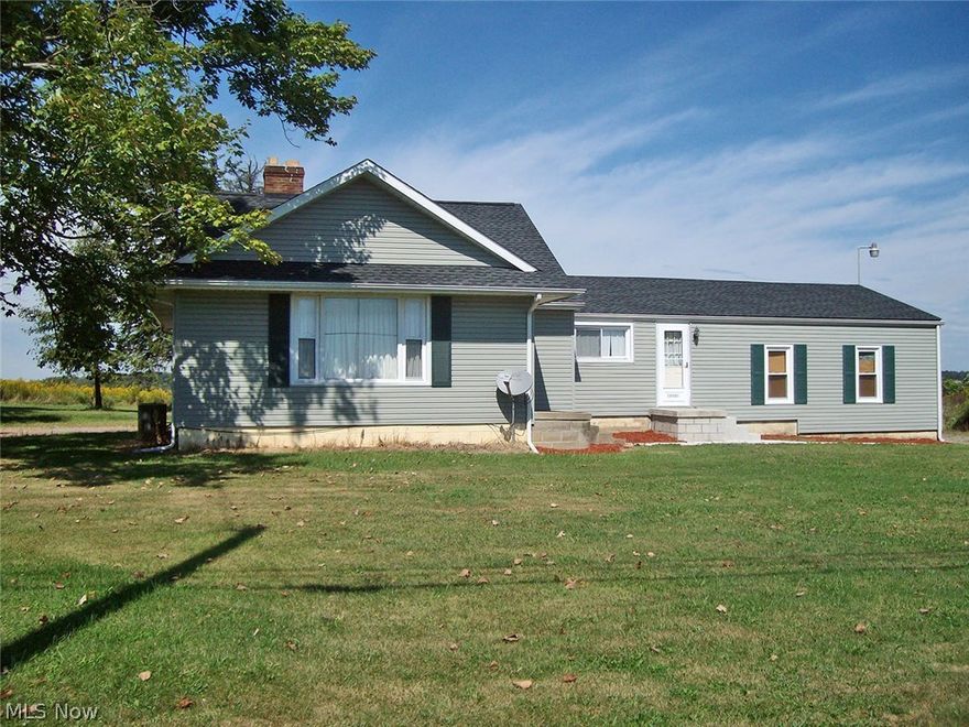 Absolute auction, all sells to highest bidders on location on Friday – October 30, 2015 at 12:00NOON.  Bungalow Home with Brick Shop Building on 5 Acres. Home w/kitchen and dining area (new floating floor 2012), lg living room w/wood burning fireplace, updated full bath, 2 bedrooms on main floor. Upstairs features lg open area for storage or possibly 3rd bedroom. Full basement w/200 amp electric, water heater (new in 2014), LP gas forced air furnace w/central air. Many updates done all within the past 4 yrs, such as new shingles, siding, concrete steps, breaker box, furnace & CA, flooring, water heater and more.  Ready for your finishing touch. Outbuilding is a 48’ x 40’ brick shop/office/store building w/2 overhead doors, shop or office area, electric and new shingles on main floor. Partial basement has breaker electric, concrete floors and 2 sets of doors. Property has well and septic. *Auctioneer Notes: Hard to find property in Tuslaw schools- tillable acreage, many updates, a lot h