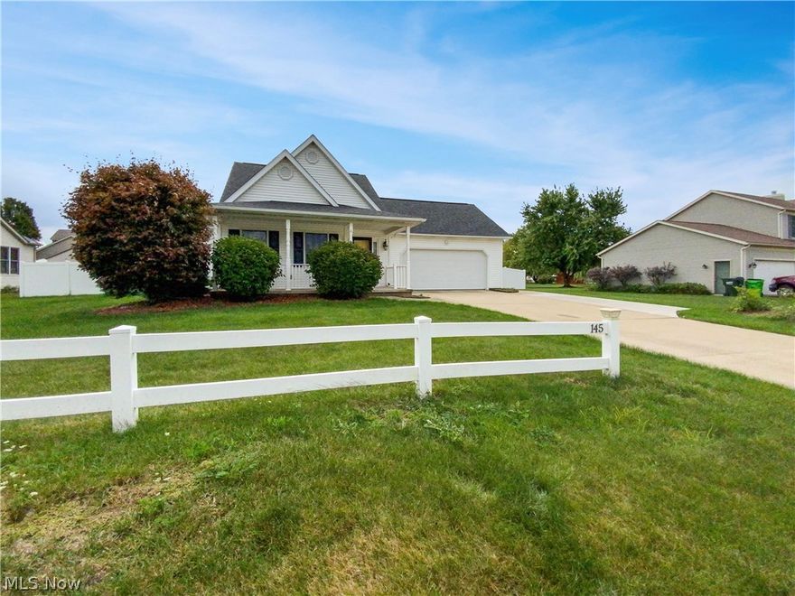 This Rittman two-story home offers a two-car garage. This home has been virtually staged to illustrate its potential.