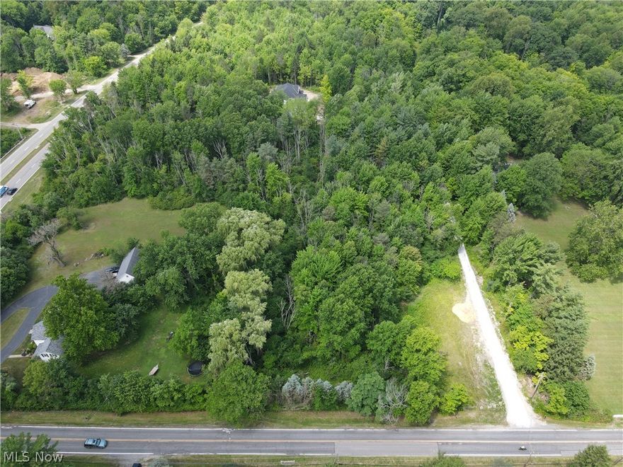 Enjoy this private wooded lot in the desirable Gates Mills area. With access to utilities at the street and approval for septic, bring your own builder and make this property into your dream home! Conveniently located near Hawken Upper School, Hillcrest Hospital, I-271 and various shops and restaurants.
