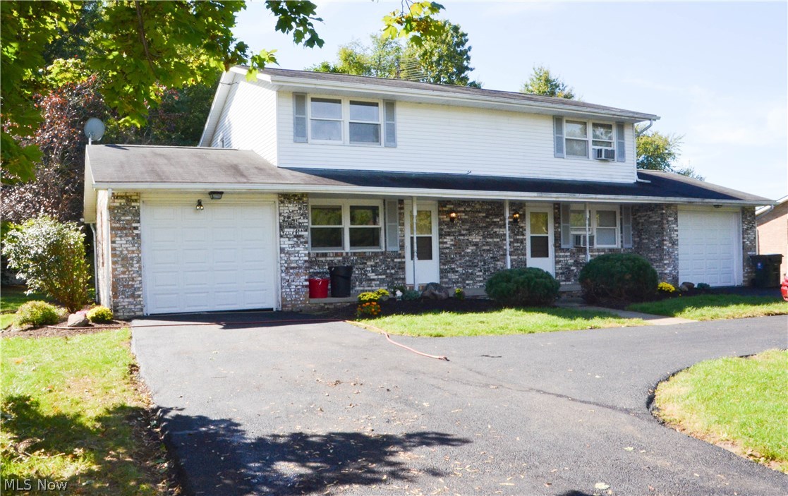 Well kept Duplex in Terrage View Estates. Each unit features two bedrooms, 1 full bath, 1 half bath, kitchen, dining room, living room, family room and laundry room. Each unit also has an attached one-car garage with access to the unit. Unit 6663 has new carpet and has been freshly painted Sept. '15. Separate patios for each unit with a privacy fence and sharing a neatly landscaped yard on .38 acres. Served by the Jackson Local School District. Great opportunity to own a low-maintenance income property.