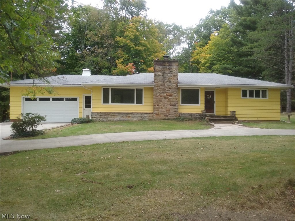 Quaint ranch tucked away on a corner lot in Richfield. Beautiful lot with yard , trees, and creek. Newer paved drive with turnaround and large stone street lamps lighting the path, two car garage attached, nice spacious basement ready to be finished, extra shower stall and toilet in basement. Large Living room with two picture windows, trim lighting, and wood burning fireplace. Freshly painted kitchen. Three bedrooms (third one has door to kitchen). Beautiful views, welcoming neighborhood, and great location. Home was previously on market, has had well and septic inspection completed. Seller has had new septic installed and well passed Summit County regulations. Check the supplements attached to this listing.