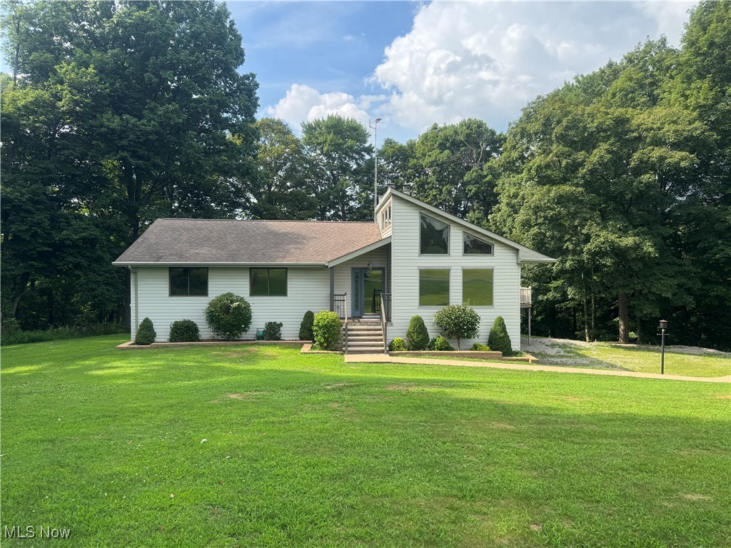 One owner Custom built home in a desirable neighborhood. Private setting with property surrounded by mature trees. Spacious entry with two large closets. Open living room and dining room for those family time gatherings. Plenty of kitchen cabinets with desk area and breakfast nook leading out to your private deck to enjoy that morning coffee. Both main baths have double bowl sinks. Lower level has full bath with a bedroom. Walk out lower level to a full concrete patio. You will see the pride of ownership in this one! Call for your private tour today