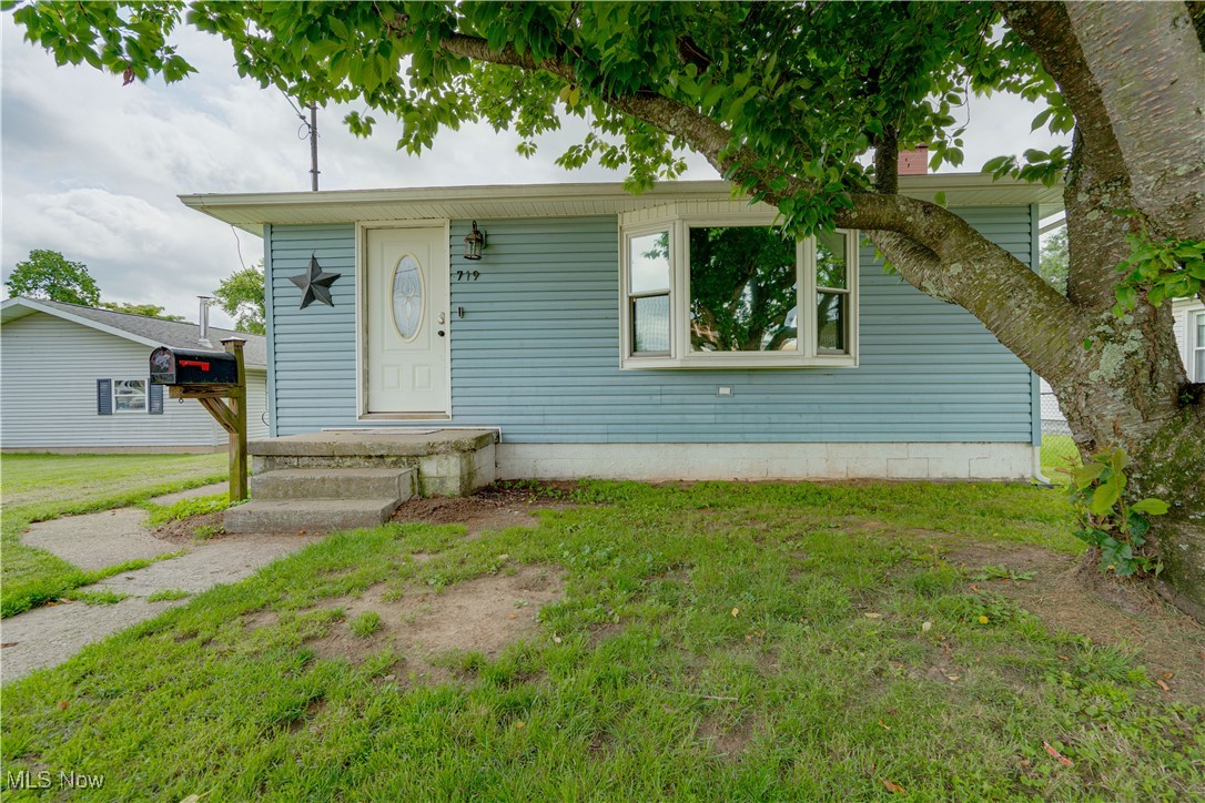 This 3–4 bedroom, 2 full bath home is located in the heart of Belpre, Ohio, and offers great potential as a personal residence, rental property, or even a duplex. The main level features three bedrooms and one full bathroom, along with a cozy living room that includes a gas or wood-burning fireplace. The spacious eat-in kitchen is equipped with attractive hickory cabinets and comes complete with appliances.
The lower level has been used as a primary en-suite with a fourth bedroom and a second full bathroom. However, if a primary suite is not needed, this space could easily serve as a family room, recreational room, home office, or bonus area—offering flexibility to fit your lifestyle or investment goals. The partially unfinished basement provides even more potential and could be converted into a separate unit for rental income.
Recent updates include an upgraded 100 amp electric service. The property is being sold as-is and will only qualify for cash or conventional financing. While it may need a little TLC, this home has solid bones and a prime location, making it a smart investment with endless possibilities.