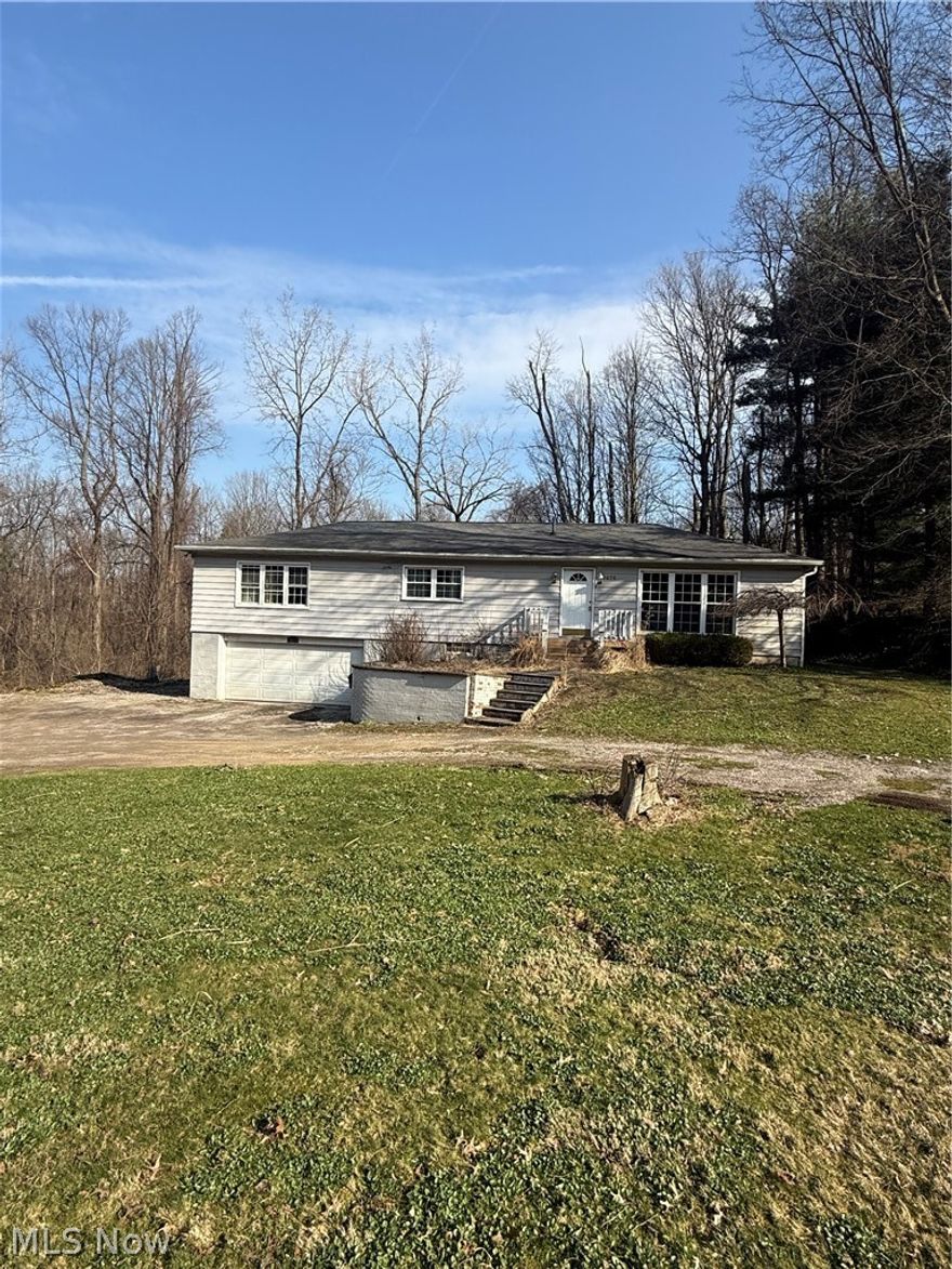 Great Opportunity for an affordable home in the country.  Priced low to sell fast, this is one of the best deals on the market.  Beautiful wooded 3-acre parcel with a walk out basement and 2 car garage.  

A little elbow grease and some paint and this piece of paradise could be yours!
