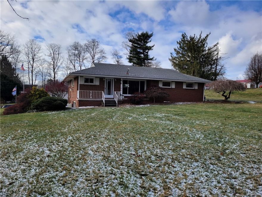 Ranch, brick home with 3 bdrms on large, level lot. Home offers living room with woodburning fireplace, nice family room, 3 bds with hardwood floors and full bath on the main level. Per seller there are hardwood floors throughout.  Full basement has additional toilet, shower and sink, garage and lots of storage.  There is a large level lot with tons of room for entertaining and additional parking.  Make your appointment today. Bring your ideas to make this home your own. Property sells as is with buyers right to inspections.