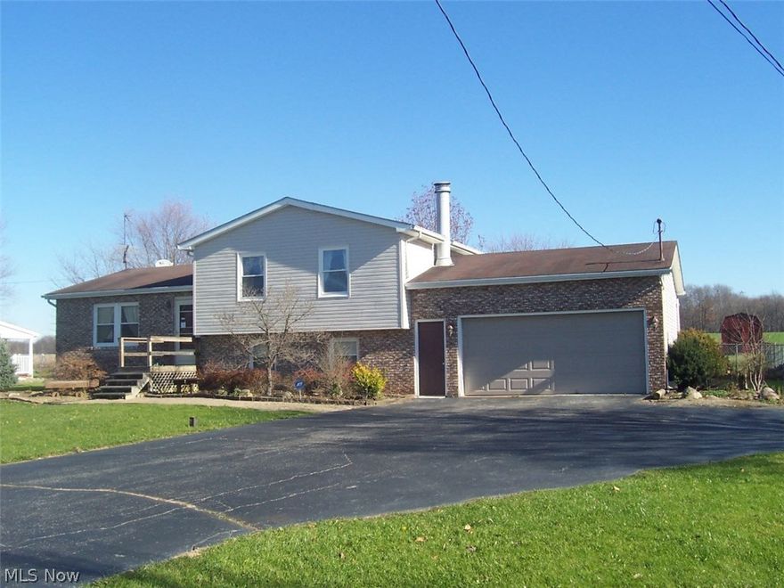 Large 3 bedroom 4 level split in excellent condition. Large lot, fenced back yard and above ground pool. Large familyroom w/fireplace. 2 full baths. Maintenance free exterior. Updated septic.