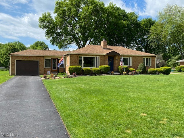 Absolutely mint condition, this brick ranch features an updated kitchen with granite counter tops, stainless steel appliances and new luxury vinyl title. Bathroom has been fully remodeled and has a wonderful new 5' walk-in shower, and there beautiful hardwood floors. Charming enclosed porch, wood burner insert in fireplace to cozy up to in Winter and fabulous partially fenced in .93 acre lot. New furnace and AC 2017. New roof 2014