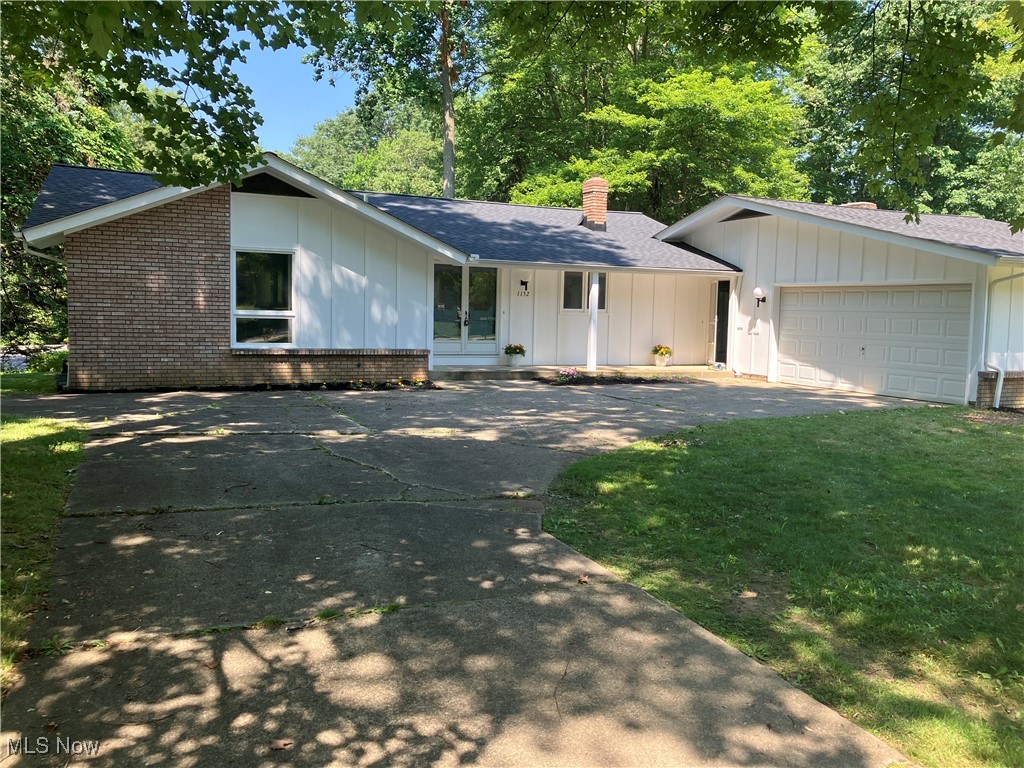 Must See Beautifully Remodeled 3 BR 2BA Ranch home in South Euclid! Look no further for your new home, this property has it all! From the new LVP flooring in the living areas to a brand new HVAC system, This home is MOVE IN READY and LOW MAINTENANCE! The large entryway foyer has new paint and flooring as well as new light fixtures. The kitchen has been updated with a new dishwasher and stove, newer refrigerator, fresh paint and new fixtures. The fireplace and vaulted ceilings in the family room give the space an expansive open feel. The living room and dining room open to the back yard through a sliding glass door, and all living spaces have brand new LVP flooring, paint and light fixtures. The bedroom area is separate from the living area, and all 3 bedrooms have beautiful original hardwood floors and new light fixtures/ceiling fans. The primary bedroom has 2 walk-in closets and an en-suite bath with new shower surround and new fixtures. The hall bathroom has been updated with new fixtures, paint and tile. The unfinished basement is clean, dry and huge! Enjoy 1424 sq/ft of basement space with full height ceilings, lots of room for storage, and/or potential added living space. The attached 2 car garage has a separate workshop area and an automatic garage door opener. The laundry room is conveniently located off the garage entrance, and has a utility sink. The yard was recently landscaped with seasonal flowers and plants. The home is located in a lovely residential area close to shopping and parks. All the big expenses are already taken care of for you, Roof (tear off-2023), HVAC (new 2025), Electrical Panel Box (Federal Pacific panel box completely replaced 2025), Appliances (new 2025), Flooring in Living areas (2025), Paint throughout (2025). This may just be the one you've been waiting for! Come take a look!