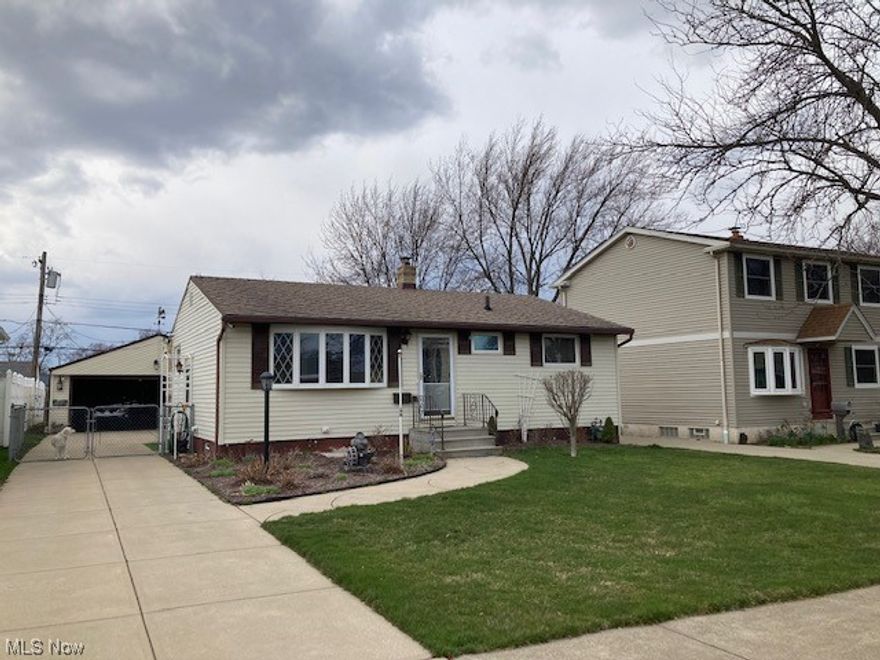 Welcome Home To This Nicely Remodeled Ranch with Durable and Beautiful Laminate Floors Throughout. The Kitchen Has Been Remodeled With New Cabinets, Counters and a Breakfast Bar. All Appliances Are Included. The Dining Room Includes Quality Built-In Cabinets. The Main Bath Features Ceramic Tile Floors and Tub Surround. The Ample Living Room is Accented By a Gorgeous Bay Window. The Main Floor Features New Six Panel Doors and Much New Millwork. You Will Be Amazed By the Huge Finished Basement Rec Room, Finished Workshop and Half Bath. Newer Roof, Vinyl Windows, 5 Year Old HVAC. Fenced Yard With Covered Patio & Two Car Garage. This Is a Great Place To Call Home!!