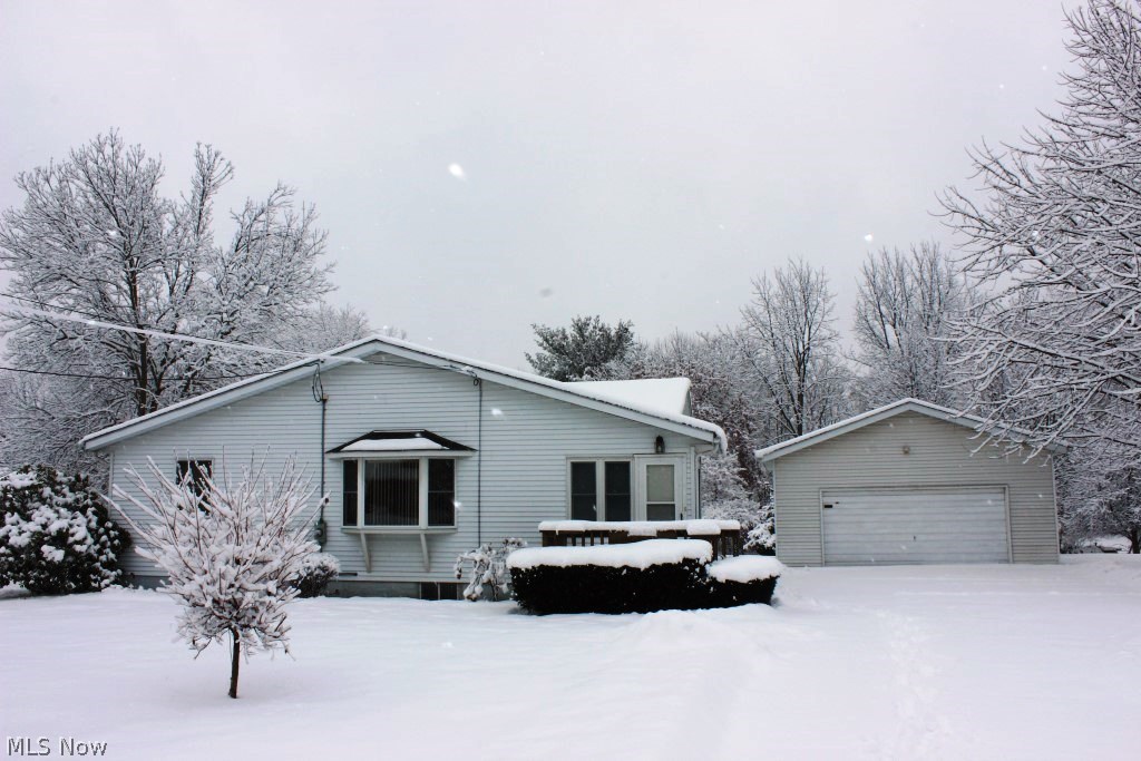 A must see on the spacious ranch on .9 acre (170x230) with 3 bedrooms, 1 bath, 1564SF & numerous updates* All neutral décor* Living room with bay window* Updated eat in kitchen 10/07 with oak cabinets, corian, sky light & stainless range & refrigerator* Formal dining room* 1st floor laundry with cabinets (gas connection for dryer)* Updated bath with large linen closet & sky light* 4 season sunroom with fan & access to back yard* Enclosed front porch 9x7* Enclosed mud room 7x12* Windows are not original* Shingles, single layer, 30 year 7/09 (house & garage)* Central air* Ceiling fans most rooms* Updated electrical box* Softener* Electronic air cleaner* 2 car detached garage* 2 storage buildings* Immediate possession upon close*