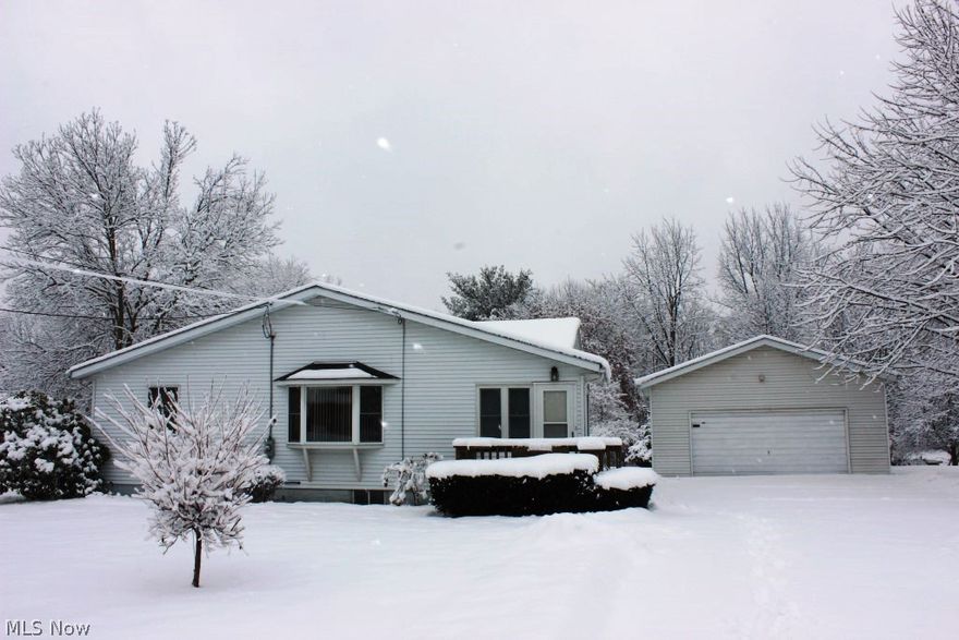 A must see on the spacious ranch on .9 acre (170x230) with 3 bedrooms, 1 bath, 1564SF & numerous updates* All neutral décor* Living room with bay window* Updated eat in kitchen 10/07 with oak cabinets, corian, sky light & stainless range & refrigerator* Formal dining room* 1st floor laundry with cabinets (gas connection for dryer)* Updated bath with large linen closet & sky light* 4 season sunroom with fan & access to back yard* Enclosed front porch 9x7* Enclosed mud room 7x12* Windows are not original* Shingles, single layer, 30 year 7/09 (house & garage)* Central air* Ceiling fans most rooms* Updated electrical box* Softener* Electronic air cleaner* 2 car detached garage* 2 storage buildings* Immediate possession upon close*