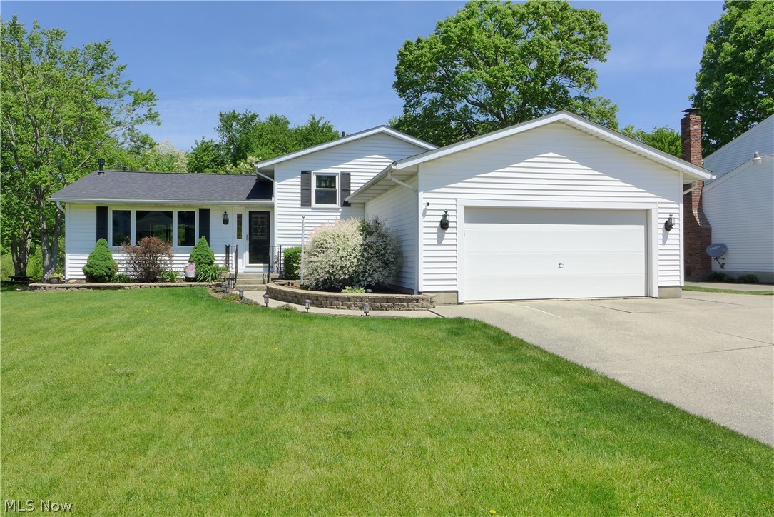 ** Multiple Offers -- Highest and best due by Saturday, May 18 at 8:00 PM ** Welcome to this stunning 4-level split located in Brunswick Hills. As you step inside, you are welcomed by a spacious open floor plan that is perfect for entertaining family and friends. The bright and airy living room features wood flooring with a large picture window that floods the space with natural light. The kitchen boasts a large island with breakfast bar, oak cabinetry, ceramic floors and all appliances. Separate dining area with a sliding door that opens to an elevated deck. The spacious lower level features a family room, office and a full bath. 3 Bedrooms and an additional full bath are located on the second floor. Unfinished basement with glass block windows. Impressive oversized and expanded heated garage, boasting 750 sq ft of space and a convenient 4 ft door that opens directly to the backyard. Imagine the possibilities for this incredible garage - whether you're a car enthusiast looking for extra storage or a handyman in need of workspace, this space has it all. Extra wide driveway with additional parking on side of garage. The fenced-in backyard provides privacy, while the storage shed offers plenty of room for all your outdoor equipment. The backyard also backs up to township owned greenbelt preserve, creating a serene backdrop for your everyday life. Recent updates include a newer roof, windows, furnace, A/C and water heater. Don't miss out on this extraordinary opportunity - schedule your showing today!