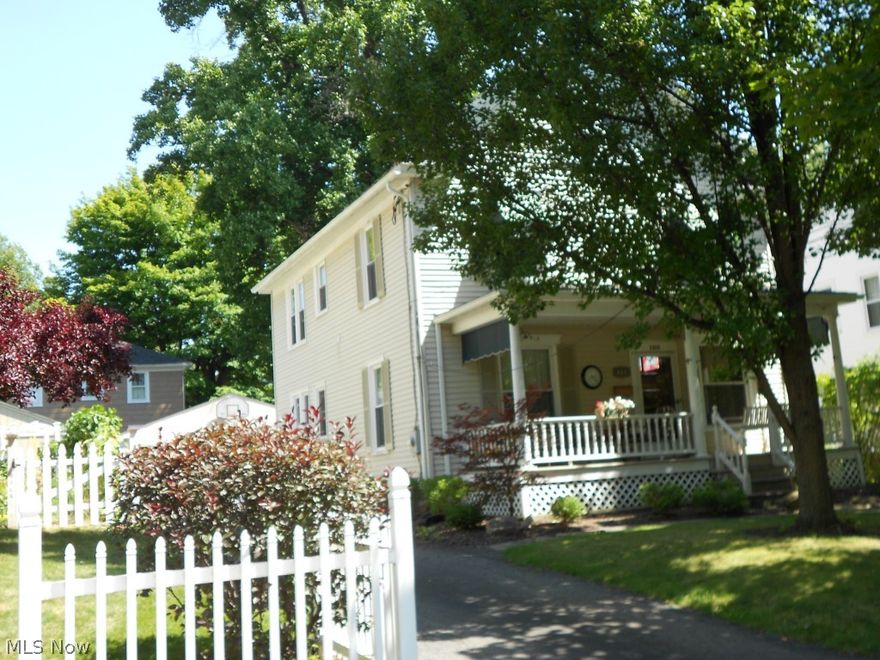 Charming, well-kept home on tree-lined street. Extra outdoor entertaining space with back patio and lovely covered front porch. Interior boasts stately high ceilings and carved wooden staircase and beautiful stained glass window in the foyer. Powder room on first floor. Elegant dining room with window seat and built-in corner china closet.  Sunny eat-in kitchen with back staircase to second floor and access to quaint lattice covered back porch, patio and detached 2-car garage.  Second floor has 3/4 bedrooms with updated bath. Third floor has hardwood floors and can be used for 1 bedroom with an additional family room/office.