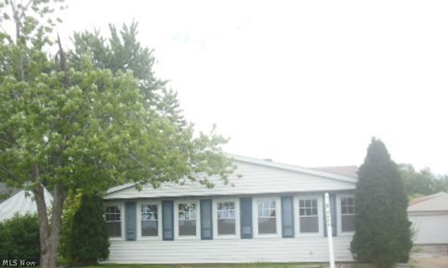 HomePath property! Large home near schools, park and local area amenities. Roomy floor plan with ample sized kitchen and living rooms. Plenty of oak cabinet and countertop space.  First floor laundry room. Vinyl sided with new furnace.  Enclosed porch with French doors for all season enjoyment. Vinyl windows add lots of light. Give it your finishing touches and move in. Purchase this property for as little as 5% down.  Buyer responsible for own due diligence, inquiry and verification of all property information, easement, condition, parcel. Buyer to assume Point of Sale Violations/escrow amounts. Broker is not liable or responsible to verify any information as all data in MLS is reflective of public records. Buyers recommended to investigate all data.