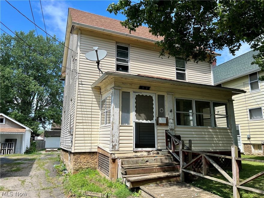 New Listing in Akron!!  Come see this 3 bedroom, 1 bathroom, Colonial style home.  While this property may come with some maintenance, with a little TLC and imagination, it would be a perfect opportunity to get into the market with either an income generating property or a new home.  The driveway is shared with the neighboring home, and there is no known agreement.  Contact your agent today, and come check it out!!
