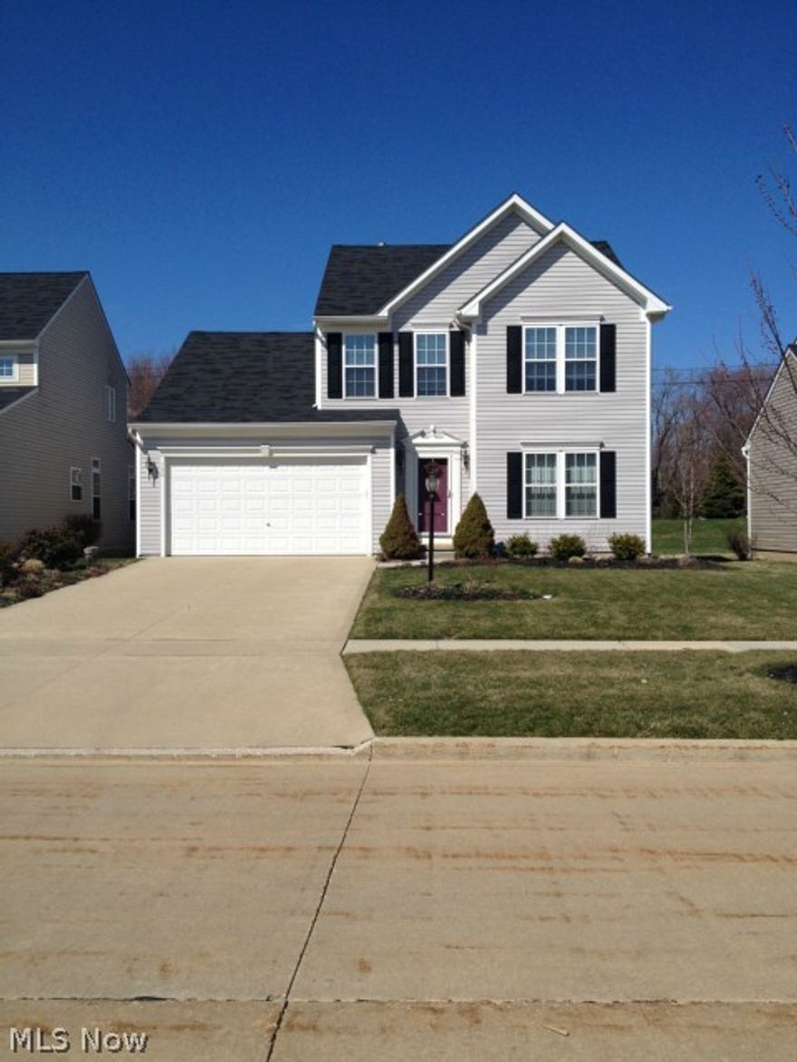 Presenting this beautiful dwelling in a gorgeous neighborhood. This stunning home, has only had one owner since constructed, as a single person with no pets. Vaulted ceilings, in the Master Suite, as well as  first level, give this open floor plan home, a light filled and airy feel. Master Bathroom with over-sized tub, create a relaxing retreat. Open Kitchen with island, newer appliances, hard wood floors, and first floor laundry, are a huge plus in day to day use. All kitchen appliances stay, as well as custom window treatments throughout the home, add to that finished touch. Finished basement, with newer carpet, and two additional storage rooms keep things neat and tidy. Outdoors, front sprinkler system, and stamped concrete patio out back, add to your entertaining needs. Little wear and tear, bring this dwelling as close to new construction as you can get, and accurately priced to sell. Close to parks, dining and shopping, only add to its value. Come and see this gorgeous home.