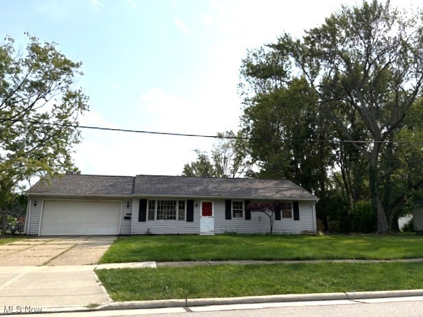Nice, vinyl sided ranch on Elyria's north side. Large living room at the front of the home with access window to the kitchen. Recent updates include vinyl plank flooring in the kitchen, laundry and bath, roof is 3 years old, kitchen countertops, built in range top and oven/broiler. There is a large room behind the garage (which is the office dimension) that can be used as an office or great for additional storage. Behind the kitchen is an enclosed porch. 3 nice sized bedrooms with ample closet space. Additional closet in hallway, bathroom and kitchen pantry. Attic access is in the garage. Sewer assessment from City of Elyria $23.85 per year.