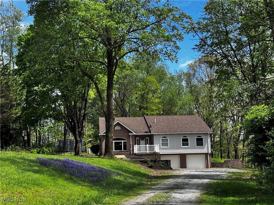 MOTIVATED SELLER!! Nestled in the country, this home boasts an open floor plan with cathedral ceilings the moment you walk in the front door.  The extra large kitchen features two kitchen sinks, two sets of cabinetry and an extra large 3 sided pantry.  The living room offers 2 double closets for storage and is perfectly open to your kitchen area for family night or all of your entertaining needs!  The master bedroom  has a walk-in closet with custom built-ins and the master bath offers heated floors, double sinks and a luxurious walk in shower. Bedroom #2 and #3 offer double closets.  The laundry room is on the main level and has attic access. Upstairs you will find a large 12x25 room to use as a 4th bedroom, an office, a rec room or additional family room... The options are yours to decide! Updates include 2 Hot Water Tanks in 2022, Roof new in 2015, new garage doors, front porch, back porch, and new back door all in 2025. The basement has been waterproofed, new smoke detectors throughout the home, new thermostat, and all custom blinds stay! You wont want to miss this one...Call today to see it all for yourself! Seller will give an allowance toward central air at closing. New Septic installed in July 2025.