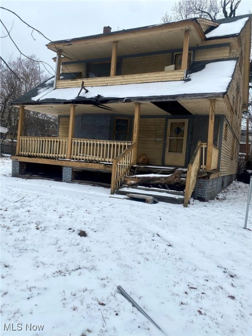 Solid income producing 2 family in stable neighborhood one block above Cleveland Cultural Gardens. Solid foundation and cleared out interior ready for your renovation.