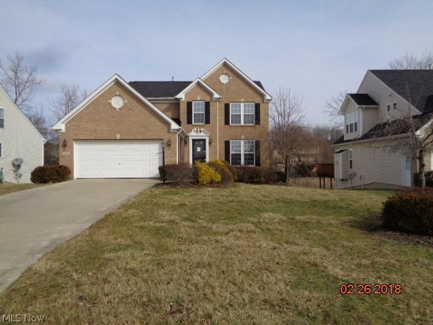 Four bedroom Colonial with 3 full baths!  Features a large master suite with private bath, open kitchen family room concept with sliders leading out to deck area overlooking backyard.  Walk out basement with full bath can be easily refinished into additional living space.  Being sold AS IS.