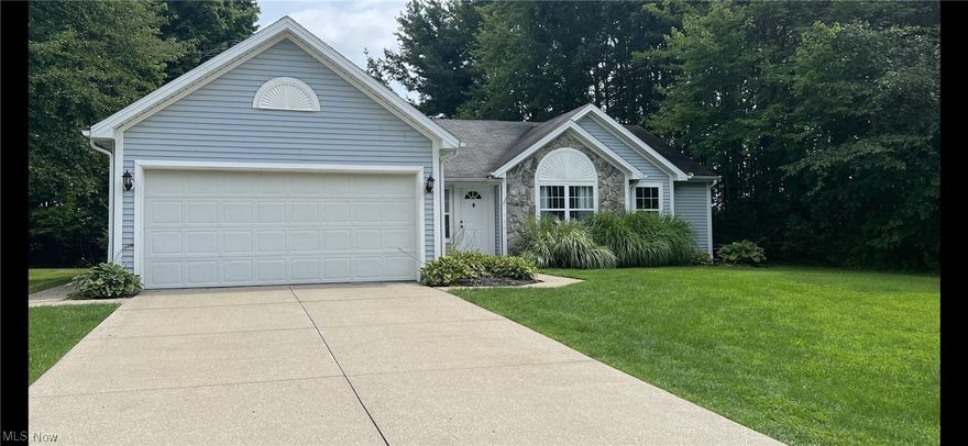 Welcome to picturesque Roaming Shores! Great curb appeal,  open concept Ranch with gas firplace and vaulted ceilings. This three bedroom two full bath home is move-in ready. Vaulted living and dining rooms opens to kitchen with ceramic flooring. Living area with an abundance of natural light has gas fireplace with floor to ceiling stone and  oak mantle. Just off kitchen and living area is a beautiful all-season sunroom that overlooks the quaint backyard with firepit area.  All three bedrooms have generous size closets. The garage has cabinets for storage, it is insulated and heated, there is additional storage available in attic above garage.