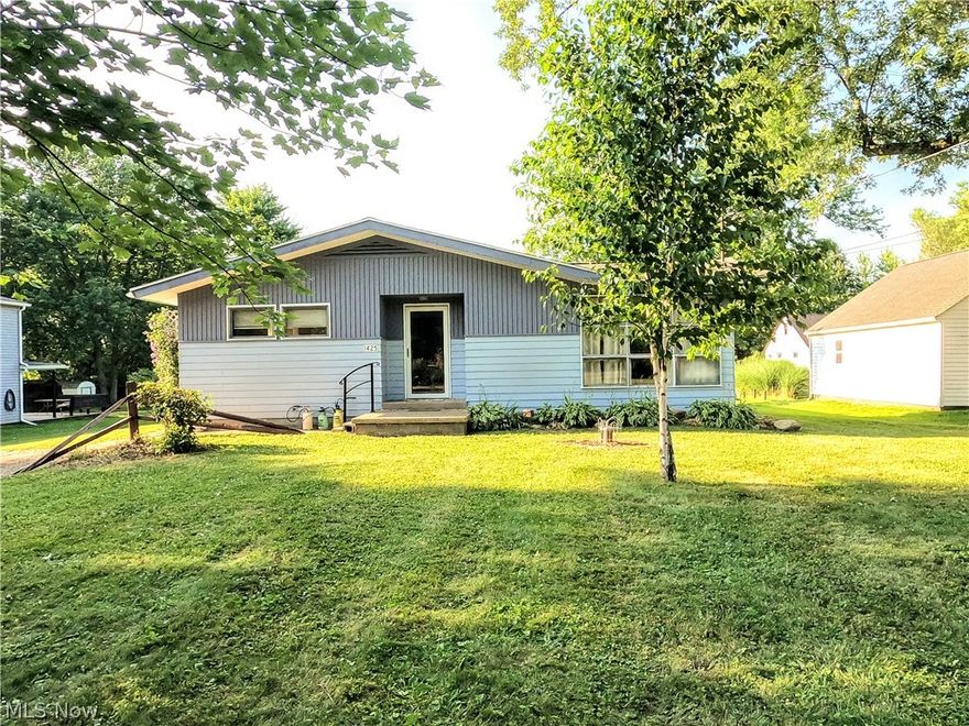 Looking for that house on an acre lot with outbuildings, garden and an easy to maintain 3 bedroom house - this is it! Close to everything yet views of beautiful countryside are abundant. This home has been with current owner since the 60's and it has the classic characteristics of 3 bedrooms ranch home with a flair of modern/contemporary design such as the two sided bathroom - all the essentials you've been looking for are here plus the land and space outdoors for the person who loves projects, gardening or raising an award winning 4H project.  Easy access to Wadsworth, Rittman and Medina.  Full basement. open kitchen and dining rooms, Nice sized living room with oversized windows that let the wonderful, natural light in.  Hardwood floors are believed to be under carpets. Outside you'll find a metal 2 story building to the back, a single story storage sbuilding and a vinyl covered Quonset Hut building. There are Berry & Fruit Trees, Perennials, Flowering shrubs - even a great asparagus patch.  There is a Home warranty - provided by sellers. Wadsworth SD, Rittman Mailing address and Medina county location.