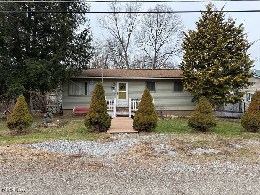 Charming ranch home in convenient Wintersville neighborhood. This home welcomes you into a warm living room that flows into an eat in kitchen with access to a nice deck. Upstairs is 3 bedrooms and a new bathroom. The basement features a ne hot water tank, and furnace. The roof is also newer